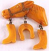 BP35 butterscotch bakelite horse charm pin